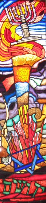 Stained glass depicting the killing of Jews.